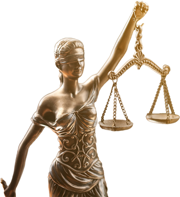 A golden female statue holding scales